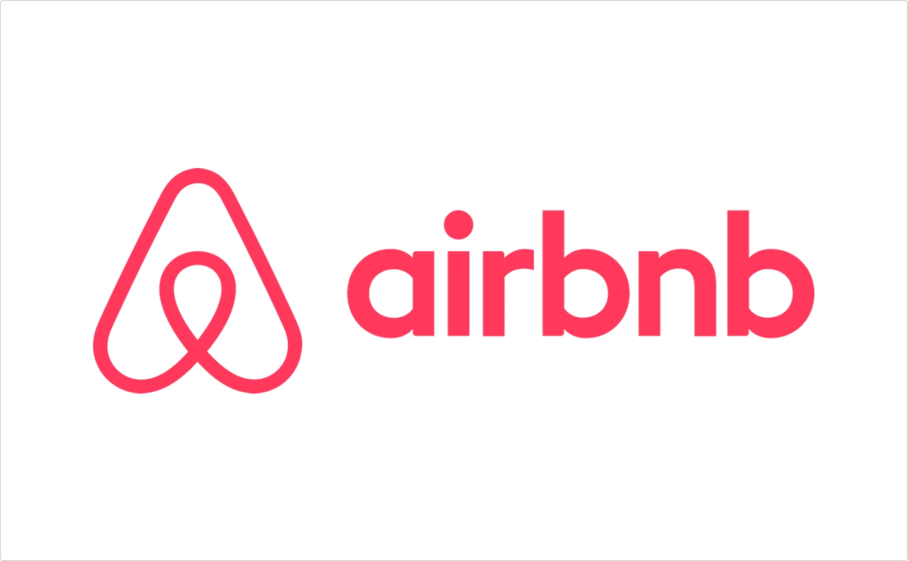 Airbnb logo featuring coral pink symbol alongside clean sans-serif typography demonstrating brand typography principles