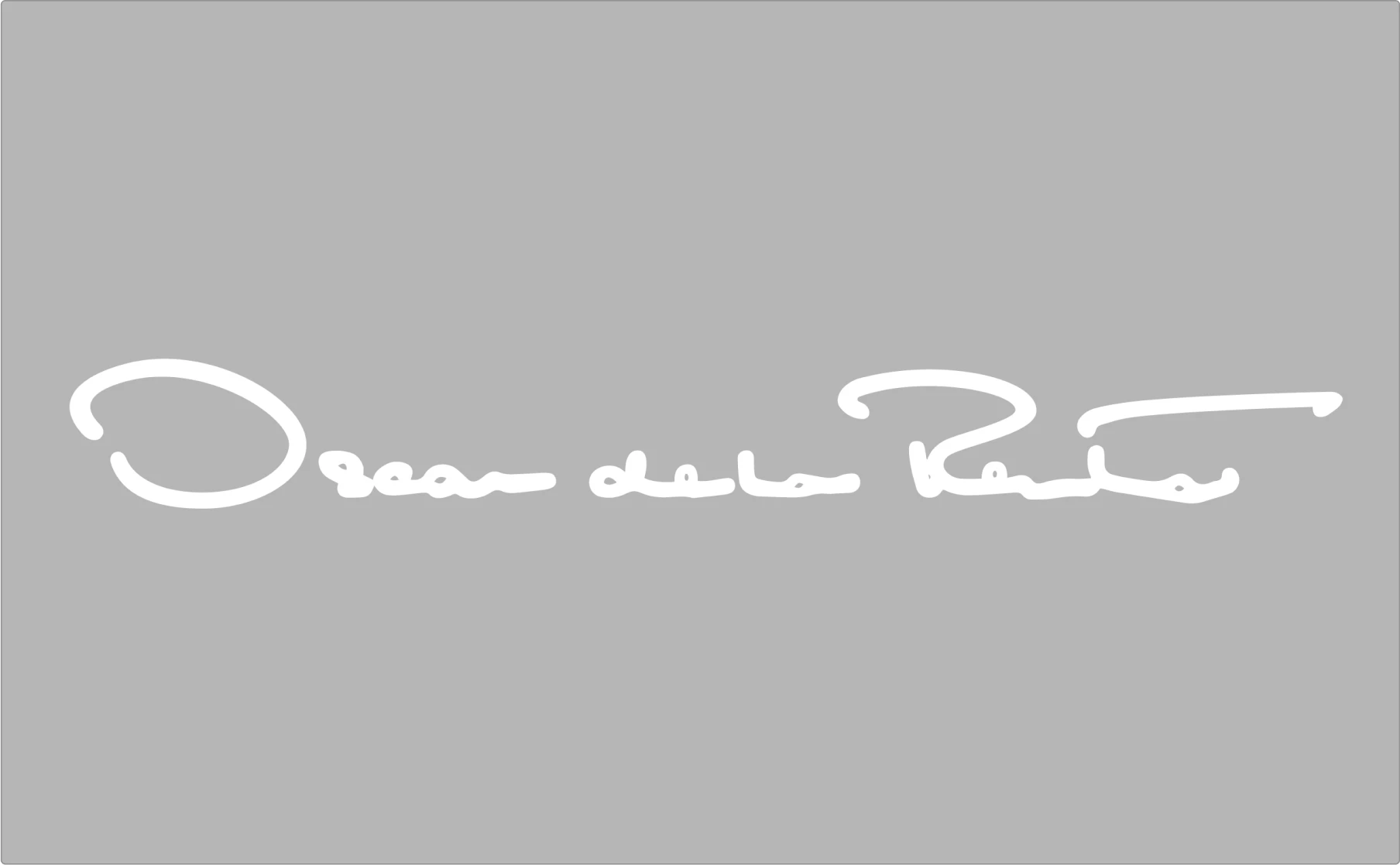 Oscar de la Renta signature script lettering design in white demonstrating luxury fashion brand wordmark