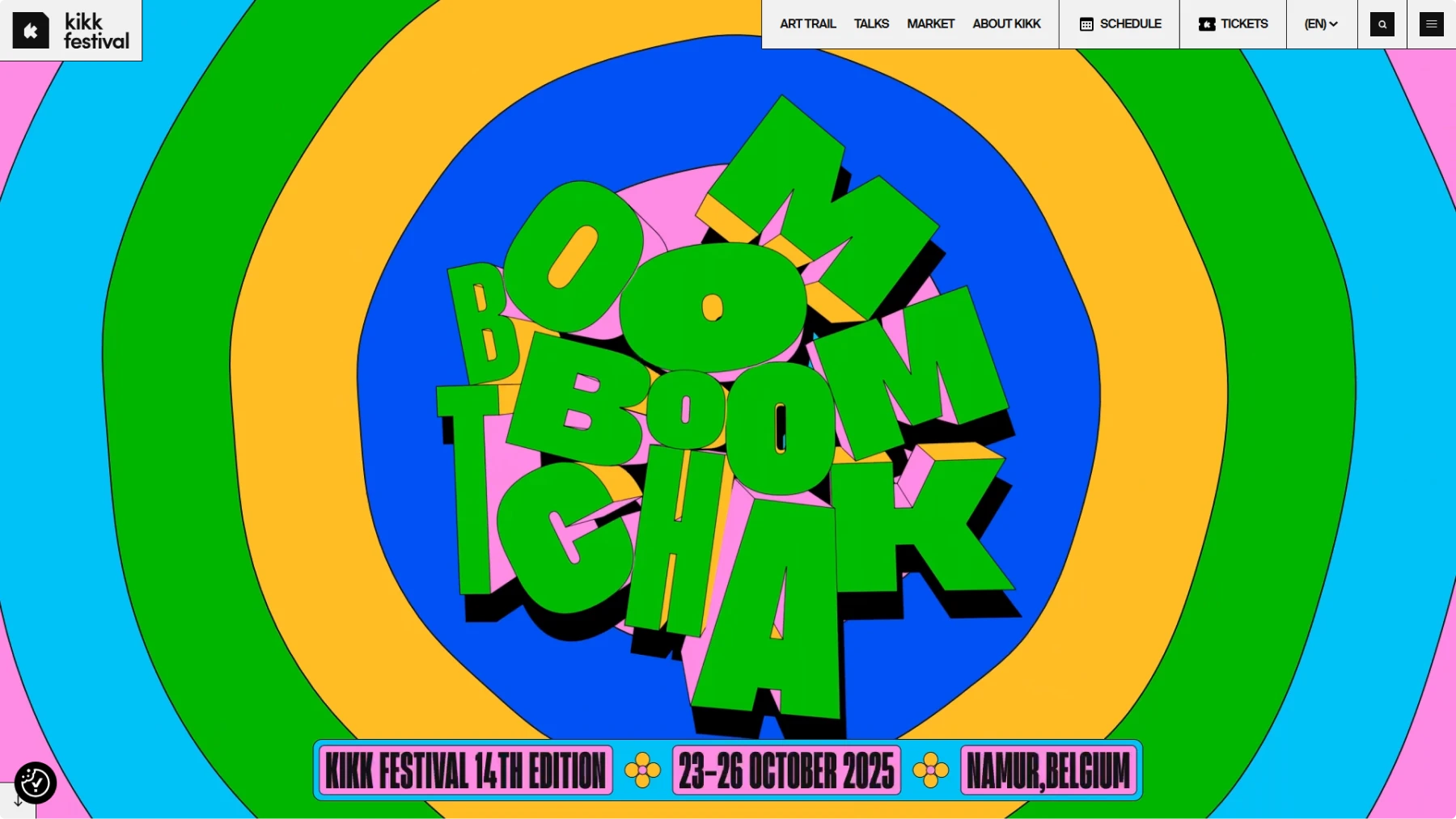 Screenshot of KIKK Festival website featuring explosive 3D "BOOM" typography in vibrant green against colorful concentric circles in blue, orange, pink, and cyan. Bold festival branding with navigation for "ART TRAIL, TALKS, MARKET, ABOUT KIKK" and event details "14TH EDITION, 23-26 OCTOBER 2025, NAMUR BELGIUM